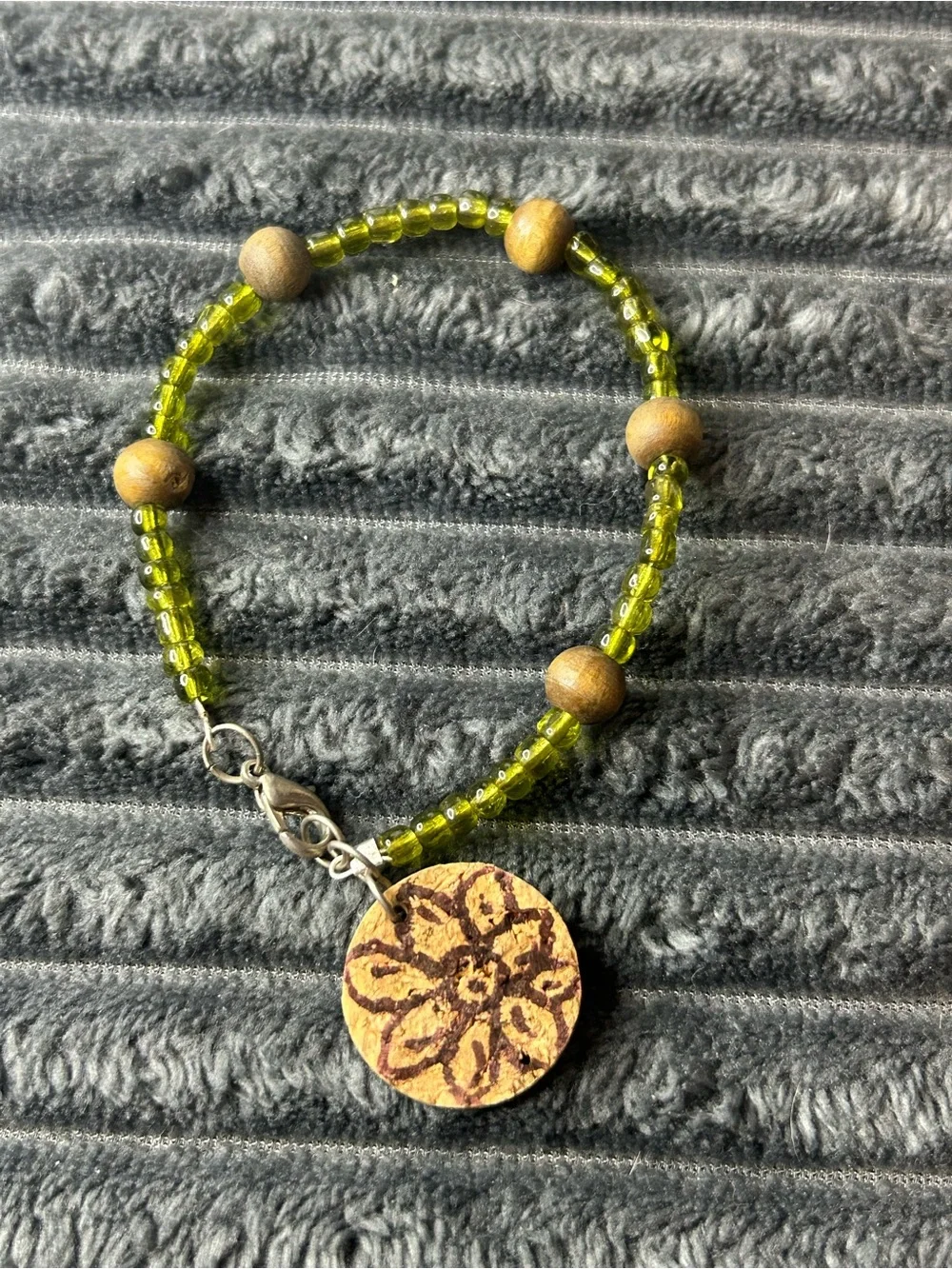 Olive Green Beaded Boho Bracelet with Wood Accents & Floral Cork Charm